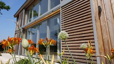 Grey wood / Aluminium windows